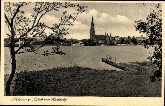 Ak Schleswig aan de Schlei, oever met uitzicht op de stad met kerk