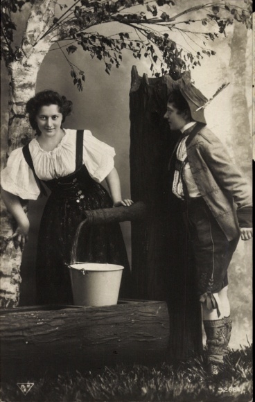 Postcard Woman drawing water from the well, hidden boy