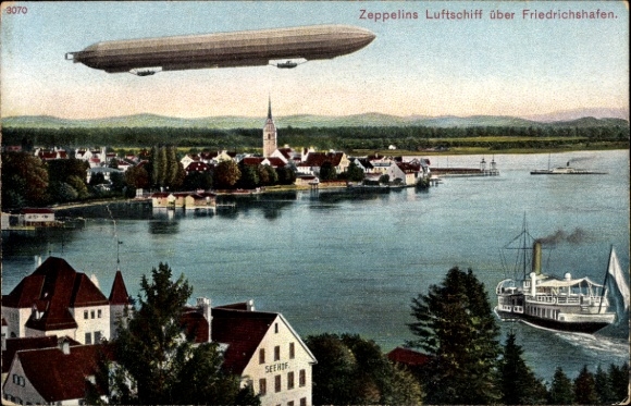 Ak Friedrichshafen am Bodensee, Panorama, Zeppelin über Stadt, Dampfer