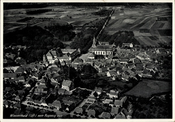 Wiesentheid village in Lower Franconia, aerial photograph, view of houses, church, rural surroundings