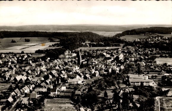 Postcard Bad Driburg in Westphalia, aerial view of many houses, forest in the background