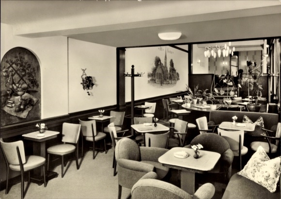 Postcard Kevelaer on the Lower Rhine, cozy café, chairs, tables, mural, flowers