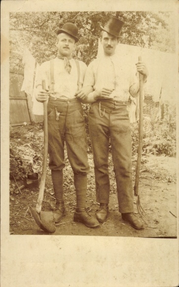 Photo Postcard Two men with shovels, clothesline