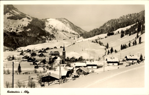 Postcard Hinterstein Bad Hindelang in the Oberallgäu, snow landscape, village view, church, mountains, winter