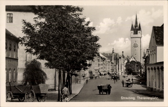 Ak Straubing an der Donau Niederbayern, Theresienplatz, Stadtansicht, Uhrturm, Pferdefuhrwerke