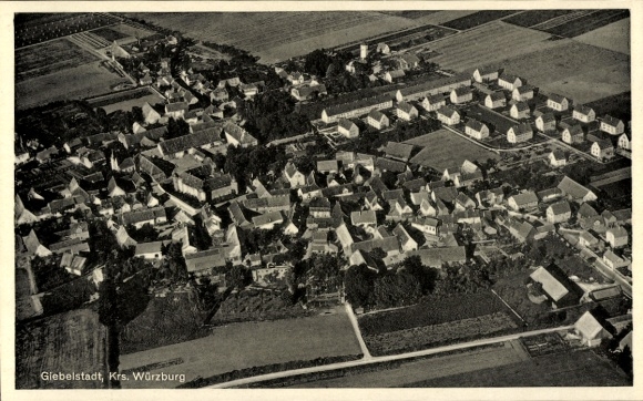 Postcard Würzburg am Main Lower Franconia, aerial view of Giebelstadt, many residential buildings, fields