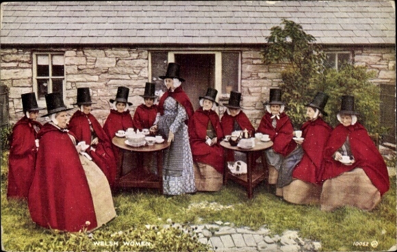 Postcard Wales, people in Welsh costumes, residential building