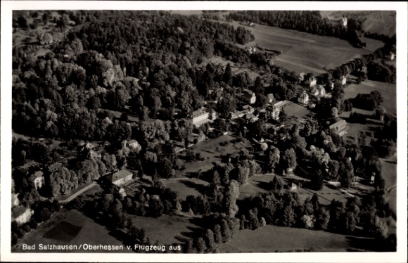 Postcard Bad Salzhausen Nidda in Hesse, aerial photograph of trees, buildings, landscape, black and white
