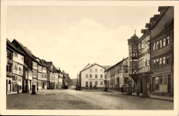 Postcard Heringen an der Werra, street with n buildings, empty street, no people visible
