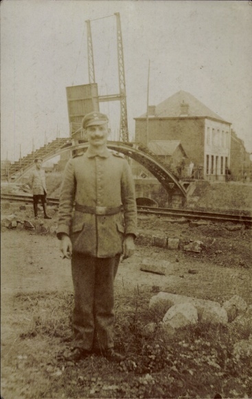 Photo Postcard German soldier in uniform at the battlefield in St. Amand, WWI