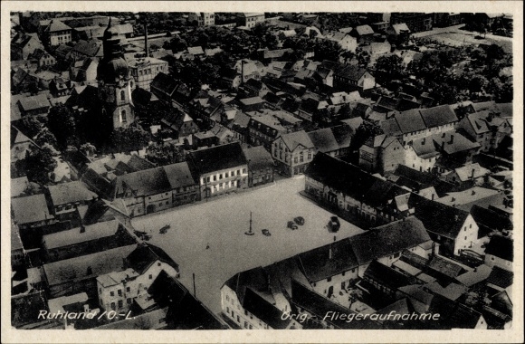 Postcard Ruhland in Oberlausitz, aerial view of the town, market