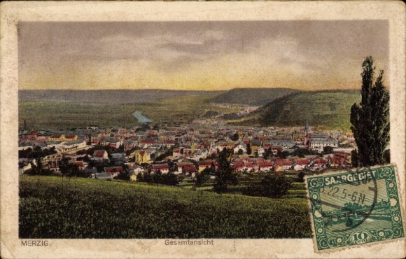 Postcard Merzig on the Saar, general view of green hills, buildings in the city, river in the background