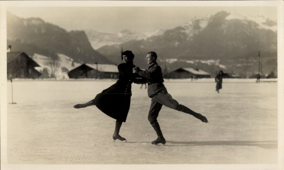 Photo of a couple skating on the ice