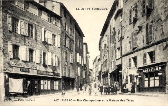 Ak Figeac Lot, Rue Champollion, Maison des Tetes