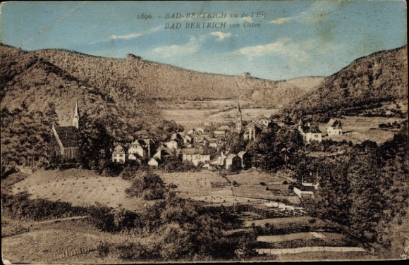 Postcard Bad Bertrich on the Mosel Eifel, view of landscape, buildings, mountains in the background
