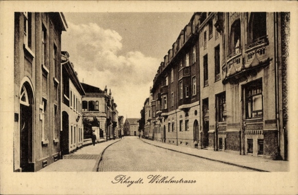Postcard Rheydt Mönchengladbach on the Lower Rhine, street with buildings, clouds in the sky, Wilhelmstrasse