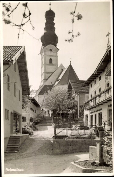 Postcard Schnaitsee in Upper Bavaria, town view, pastry shop, church tower