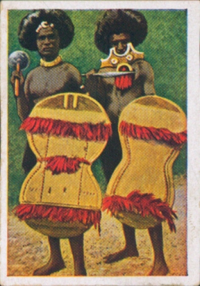 Collector's card The colorful world, Papua islanders in jewelry, Warlike finery