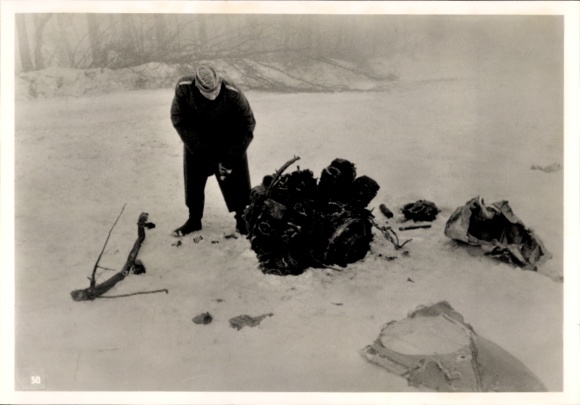 Photo Wehrmacht soldier with remains of a French aircraft, February 1940, WWII