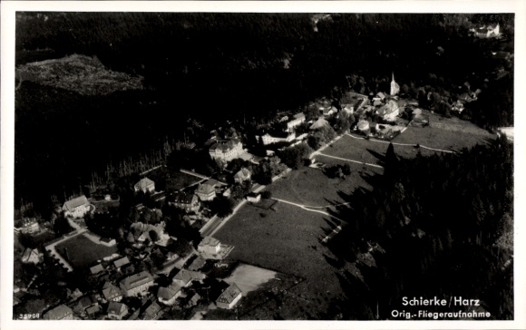 Postcard Schierke Wernigerode am Harz, aerial photograph of the town, church, forest