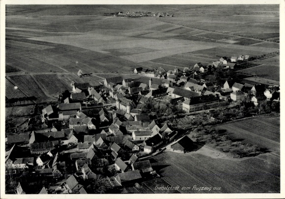 Postcard Giebelstadt in Lower Franconia, aerial photograph of landscape with fields, houses