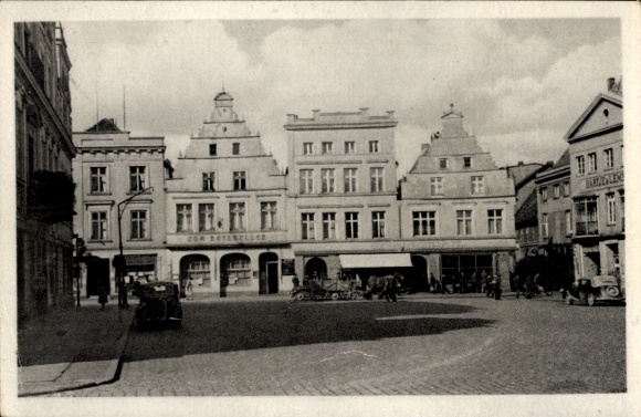 Postcard Güstrow in Mecklenburg, historical buildings, market, cars, clouds