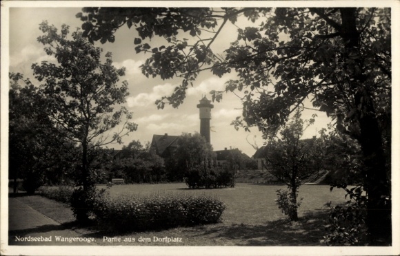 Postcard North Sea resort Wangerooge in East Frisia, village square, lighthouse