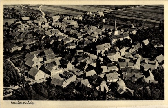 Postcard Frankenwinheim in Lower Franconia Bavaria, aerial view of numerous roofs, village church visible