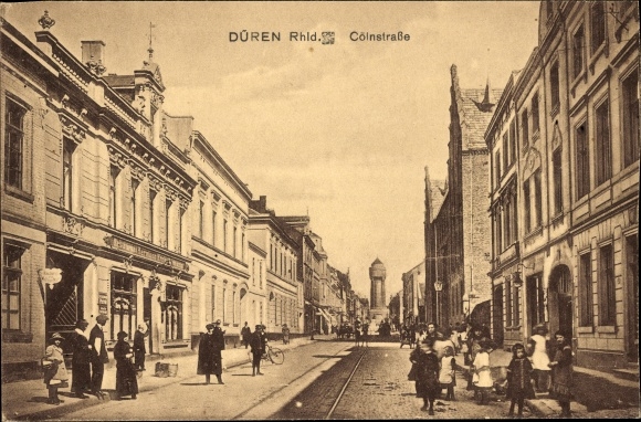 Ak Düren in Nordrhein Westfalen, Blick in die Köln Straße, Passanten, Gleise