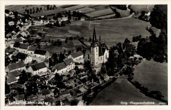 Ak Nonnweiler in Saarland, uitzicht op de stad, kerk, luchtfoto