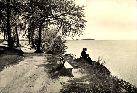 Postcard Putbus on the island of Rügen, couple at the water, quiet landscape, trees, path