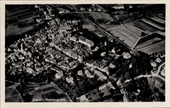 Ak Ebern in Unterfranken, Luftaufnahme von  Häuser, Felder, Landschaft