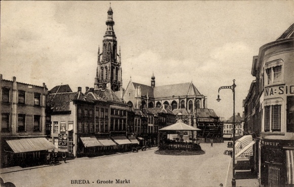 KP Breda Brabancja Północna Holandia, wieża, ludzie, tramwaj, samochody, budynki