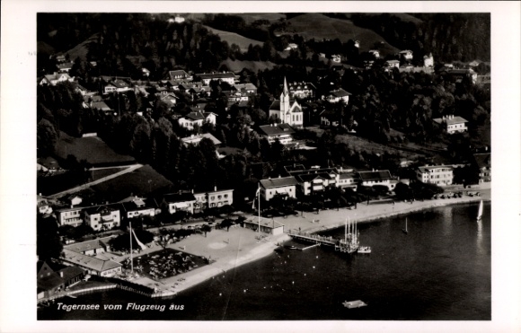 Postcard Tegernsee in Upper Bavaria, aerial view of the church, beach, sailboats