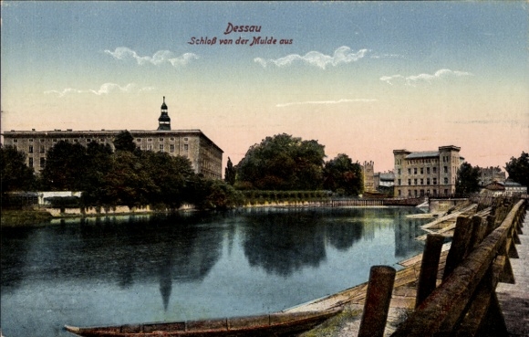 Postcard Dessau in Saxony-Anhalt, castle from the Mulde, river view, old architecture, calm waters