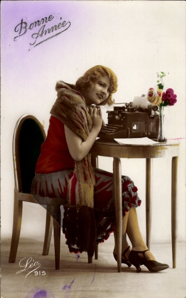 Happy New Year, woman with typewriter