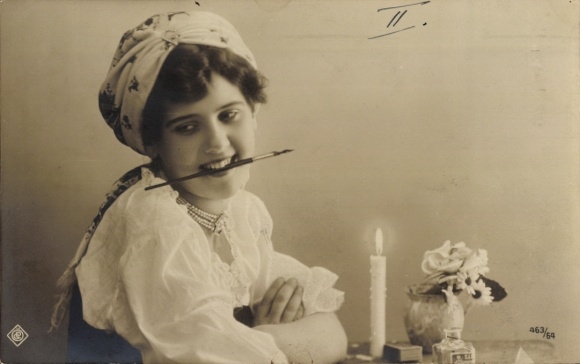Postcard Woman with pen in mouth, portrait