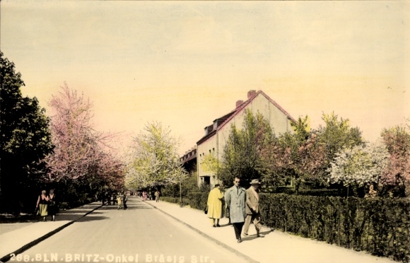 Postcard Berlin Neukölln Britz, trees in bloom, street with houses, walkers, blooming landscape