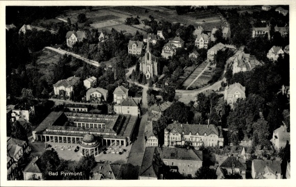 Postcard Bad Pyrmont in Lower Saxony, aerial view of buildings and park, green surroundings