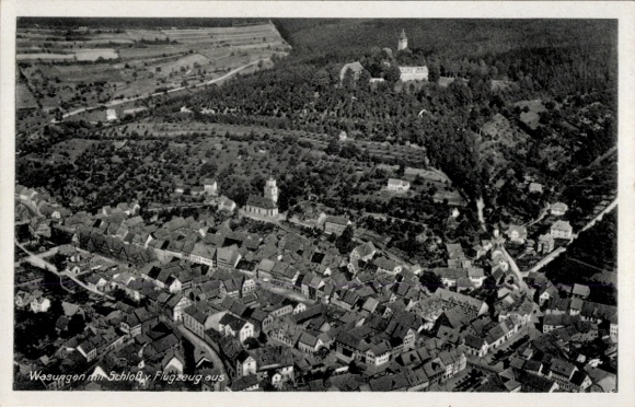 Postcard Wasungen in the Thuringian Forest, aerial photograph of the town with castle