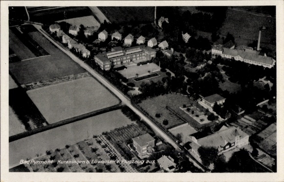 Postcard Bad Pyrmont in Lower Saxony, aerial view of spa facilities, idyllic landscape, buildings