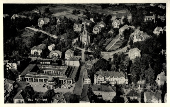Postcard Bad Pyrmont, aerial view of the town, church, Hylliger Born