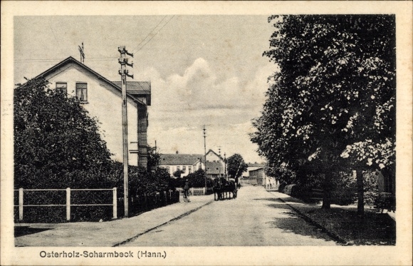 Ansichtkaart Osterholz Scharmbeck in Nedersaksen, straatdeel met paardenkoets