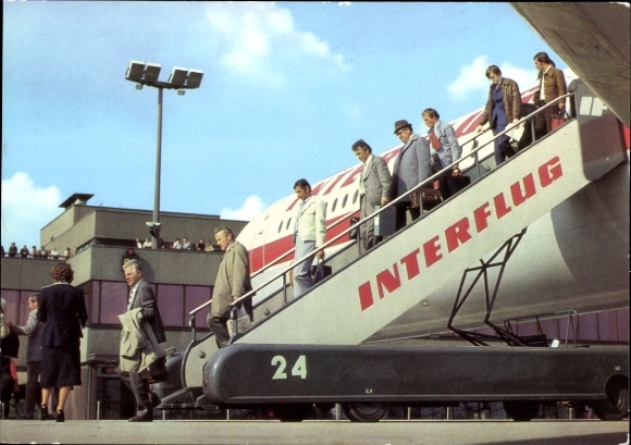 Postcard Airport Berlin-Schönefeld, passengers disembark from the Interflug plane