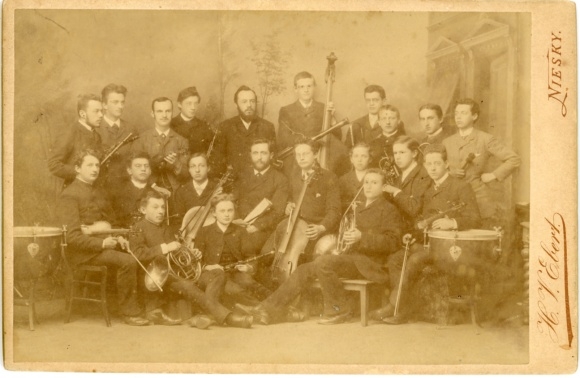 Cabinet photo orchestra with musical instruments, photographer HV Ebert, Niesky