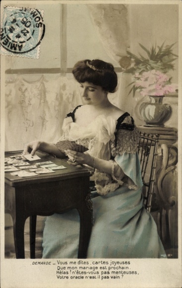 Postcard Woman lays out the cards