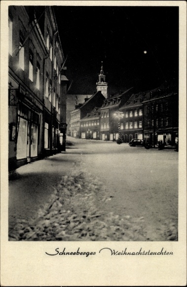 Postcard Schneeberg in the Ore Mountains, Christmas lights, street section in the city