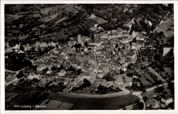 Postcard Königsberg in Bavaria Lower Franconia, aerial view of Königsberg, many houses, green landscape