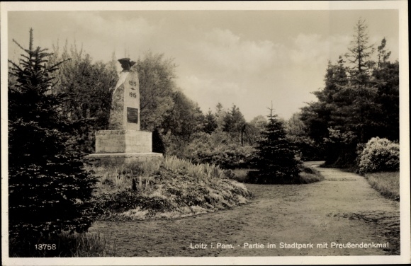 PC Loitz in Western Pomerania, city park section with Prussian monument