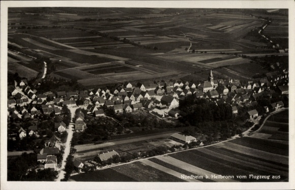 Postcard Nordheim am Neckar, aerial view of Nordheim, church, fields, residential buildings